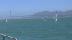 the Golden Gate Bridge and sailboats as seen from Fort Mason